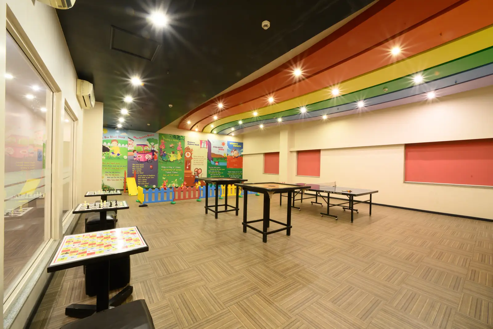 The resort's colourful indoor games room with table tennis, chess and carrom