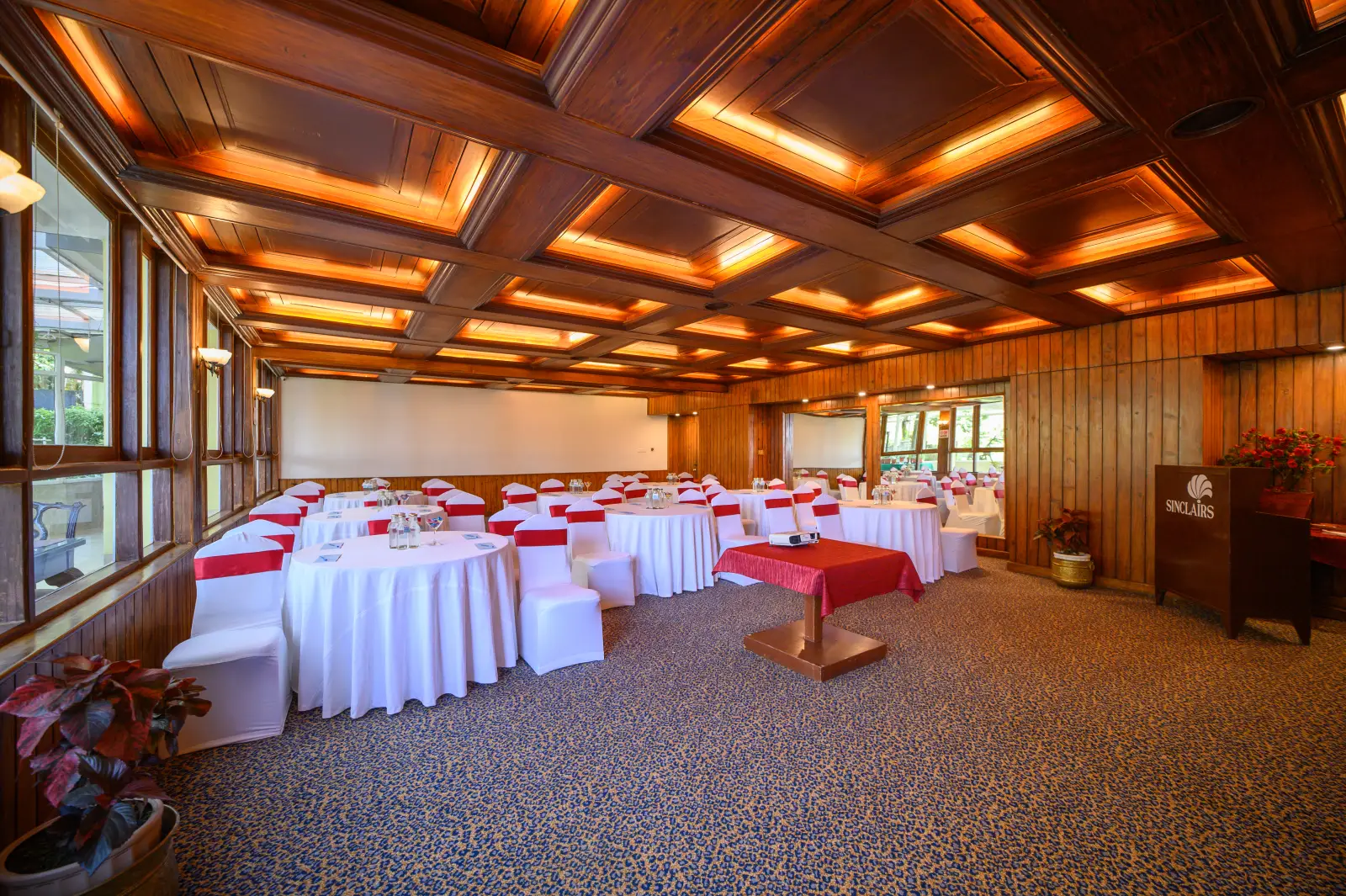 The Pinnacle banquet hall with a podium set up for a presentation