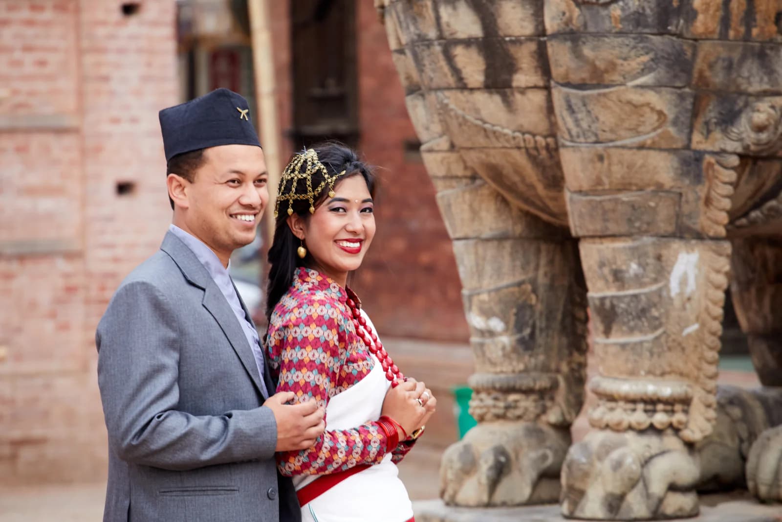 A couple exchanging vows with the Himalayas in view