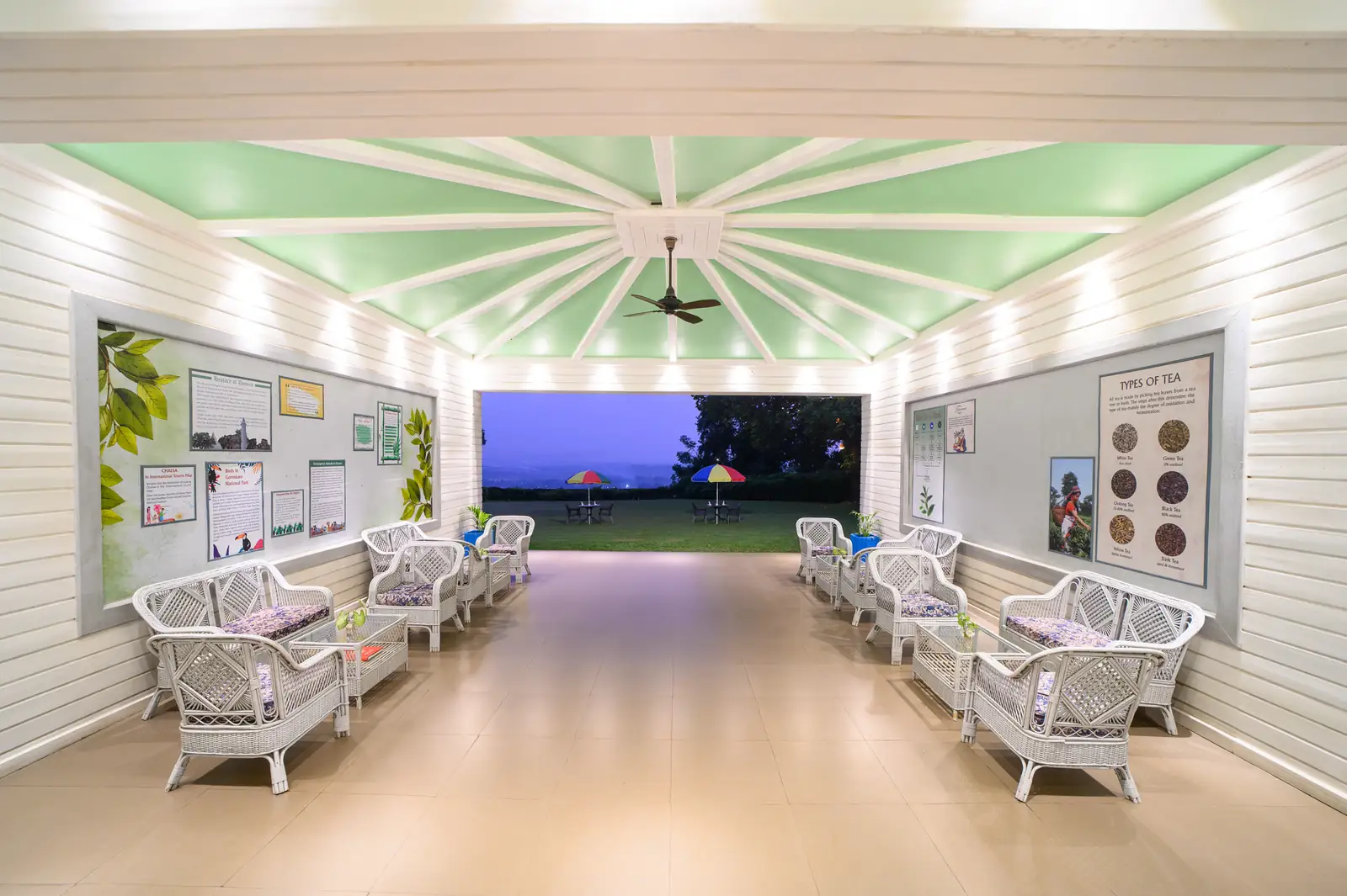 The tea lounge pavilion opening onto the lawns at dusk