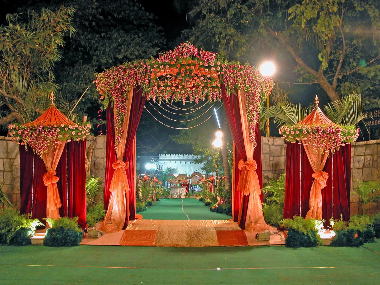 A wedding celebration set up amid the resort's natural garden surroundings