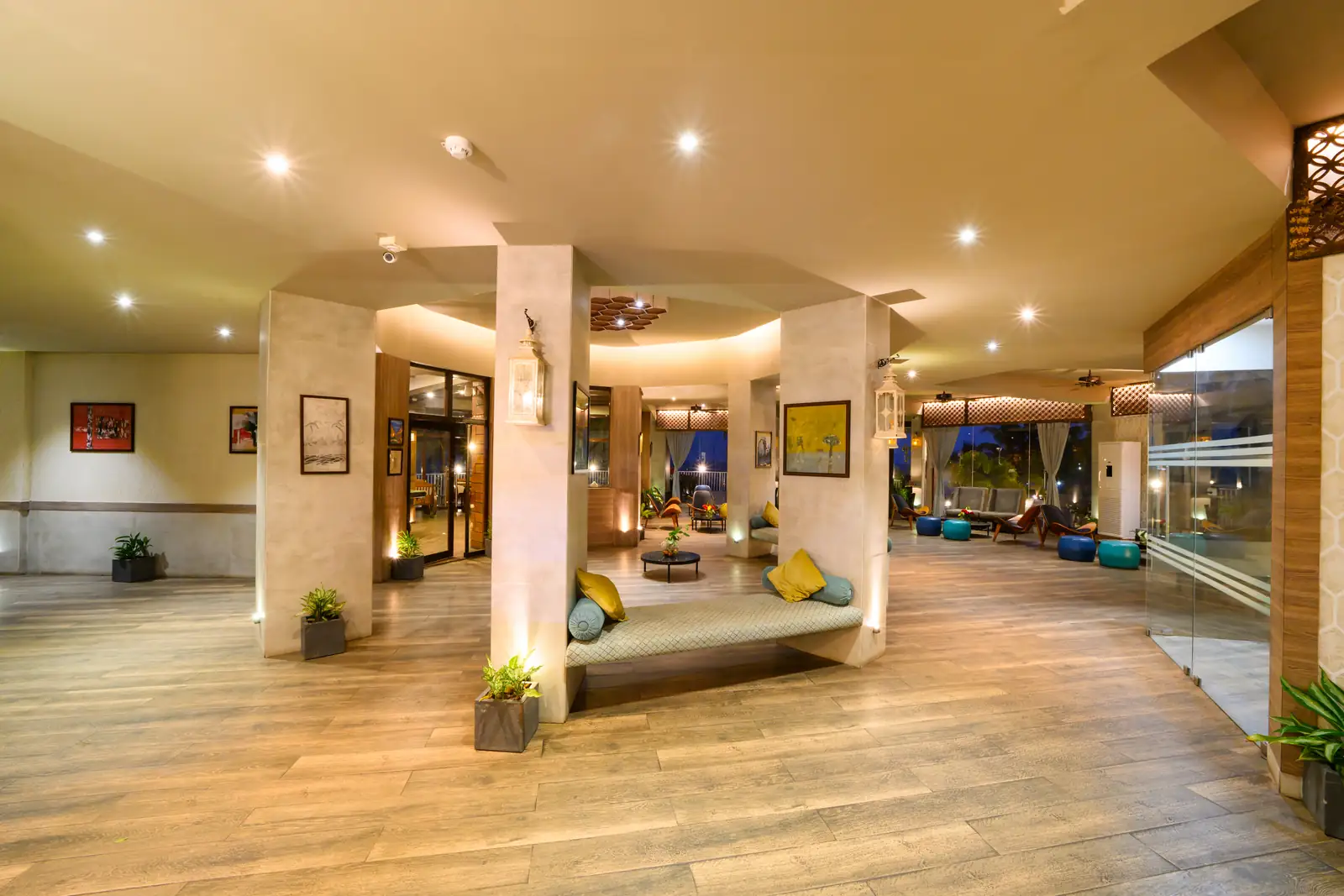 Sea-facing lounge with open verandah seating at Sinclairs Bayview